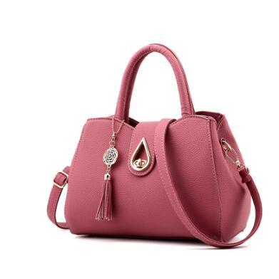 Luxury Demure Handbag   Ladies Tassel High Quality PU Leather