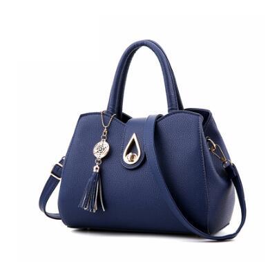 Luxury Demure Handbag   Ladies Tassel High Quality PU Leather