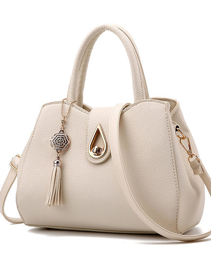 Luxury Demure Handbag   Ladies Tassel High Quality PU Leather