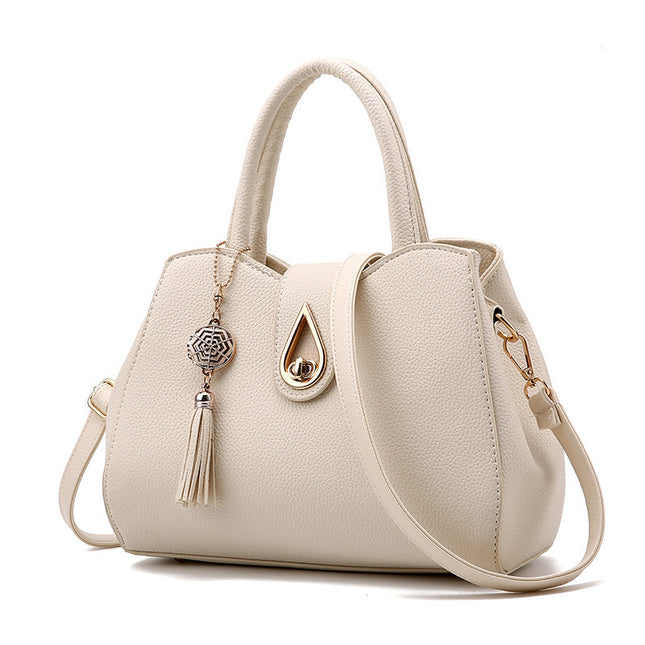 Luxury Demure Handbag   Ladies Tassel High Quality PU Leather